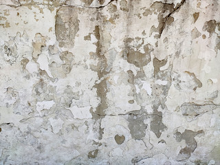 Grey Concrete Texture old wall with peeling paint, scratches and cracks