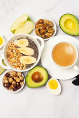 healthy varied organic breakfast on a white background
