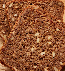sliced black cereal bread on the table