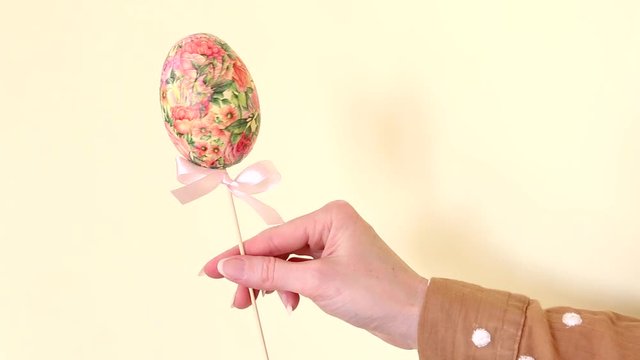 Easter egg decorated with decoupage technique. 