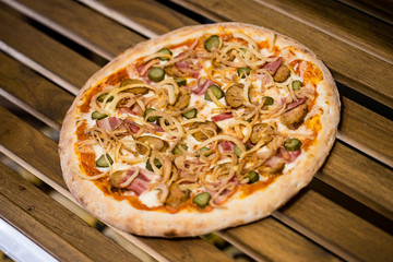 pizza on a wooden table