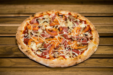 pizza on a wooden table