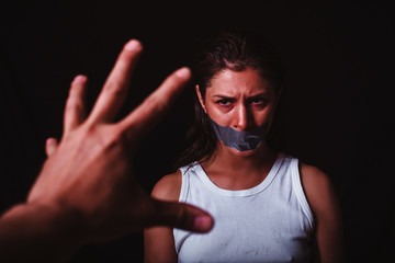 Kidnapping use hand covering girl mouth, close up woman's face feeling scared , Emotional girl...