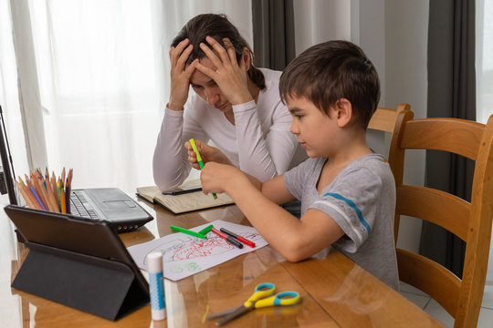 Parents Teaching Kids At Home, Home School Education, Mother Helping Her Son To Do Homework