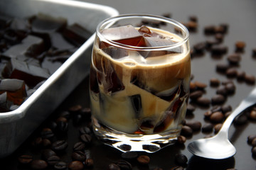 Coffee flavored jelly with milk in a glass