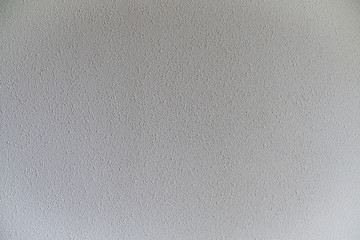 White dotted textured wall