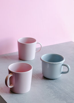 Gray and pink cups.