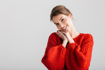 Image of joyful pretty woman smiling and looking at camera