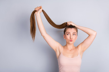 Photo of attractive overjoyed lady demonstrate ideal long healthy hairstyle raise amazing...