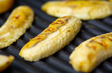 Sliced bananas on the grill