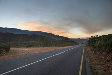 Naklejka premium the road through the mountains