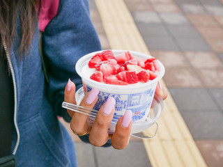 young woman eating a salad