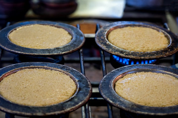 The production stages of the Antioch Kunefe dessert material. Antakya kunefe dessert, cooked and ready to serve