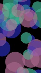 Multicolored translucent circles on a dark background. 3D illustration