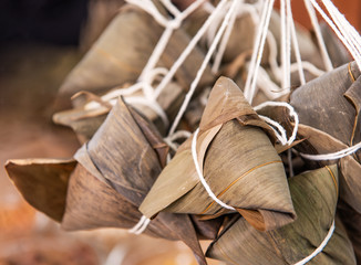 Making zongzi - ingredient of Chinese rice dumpling zongzi making on table at home for Dragon Boat Festival celebration, close up, lifestyle.