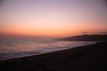 Sunset over the Ocean and the Beach