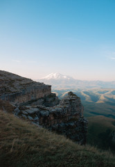 Fototapeta na wymiar Mount Elbrus, Karachay Cherkess Republic, Russian nature, plateau. The highest mountain in Europe. National Park, mountain in the snow. Dormant volcano.