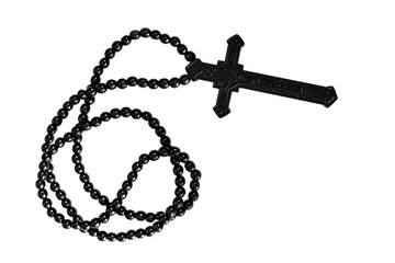 Black christian cross necklace isolated on white background.