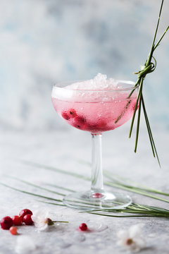 Pink Mocktail Close Up. Beverage With Rose And Prosecco Wine In Drinkware. Exotic French Martini Cocktail Portion With Crushed Ice In Glassware