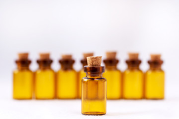 Defocused photo of amber-colored pharmaceutical vials. Copy space