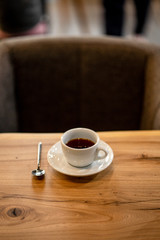 Black filter coffee on the table in cafe glass cup hario pour over cup side