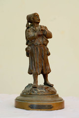 miniatur statue made wood and sand