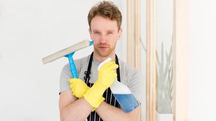 Man prepared to clean window