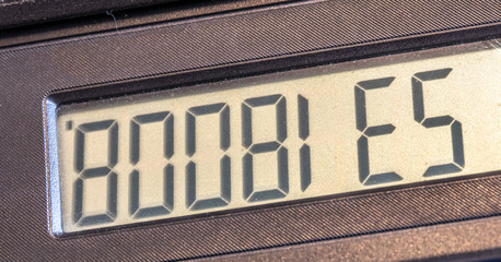 Old LCD calculator display upside down writing out a word boobies
