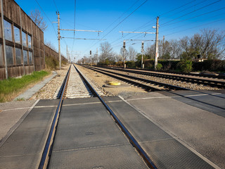 Under clear skies, the railway line can be seen. The multiple railway tracks are viewed from the...
