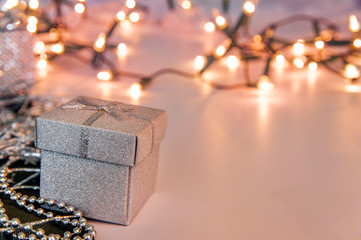 Close-up of gift box and Christmas decorations
