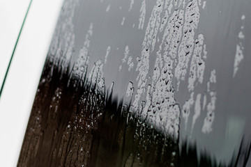 The car window with rain drops