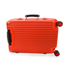 Red large polycarbonate travel plastic suitcase with wheels isolated on background