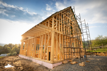 Residential home construction, frame wooden house outdoor
