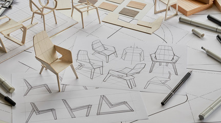 Designer sketching drawing design development product plan draft chair armchair Wingback Interior furniture prototype manufacturing production. designer studio concept . - obrazy, fototapety, plakaty