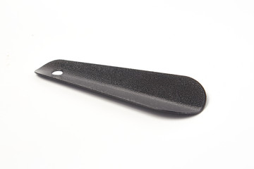 gray shoe spoon on a white background isolate