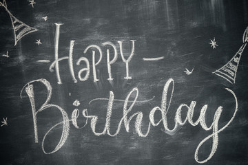 Happy birthday holiday typography design for greeting card, poster or banner, chalk inscription on...