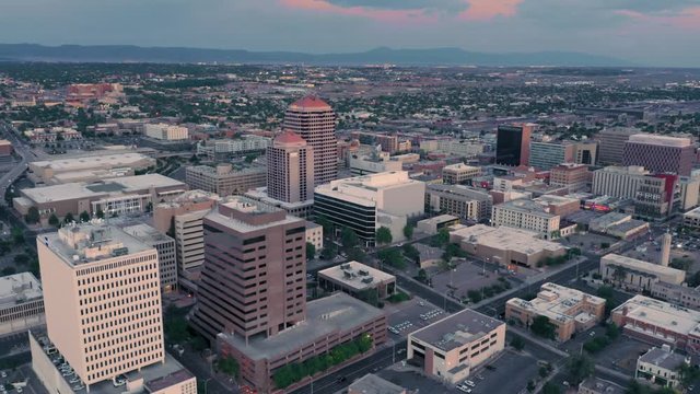 Albuquerque, New Mexico, USA. 31 September 2019. Aerial flying over the downtown city CBD at sunset