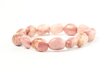 aventurine from a rhodolite semiprecious stone on a white background. close up