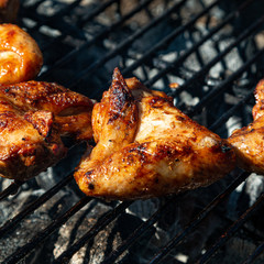 BBQ grill with chicken wings. BBQ season
