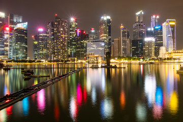 Singapore financial district skyline with colourful reflections 