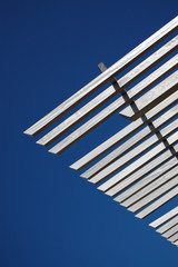Roof lines against a blue sky
