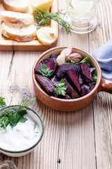 Healthy vegetarian meal, fresh Greek yoghurt with herbs, baked beetroot