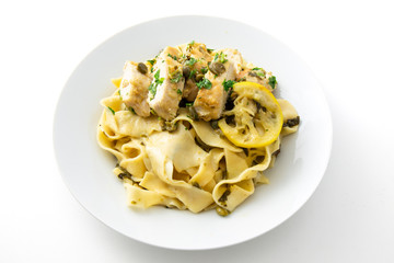 Chicken piccata with sauce, lemon and capers