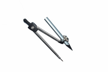 A silver pencil compass attached to a silver colored wood pencil crayon