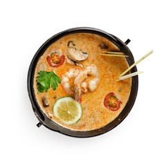 Soup Tom Yam. Thai spicy soup with shrimp and other seafood on a white background