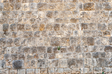 A part of an old city wall A brick background