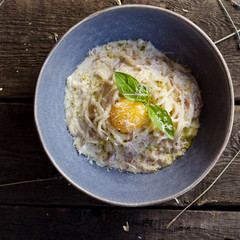 Carbonara pasta with bacon, cream sauce, Parmesan cheese and egg yolk. Traditional italian food.