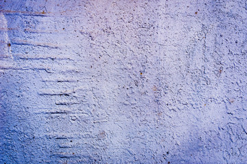Texture of a rusty metal surface: dark blue, blue, aged cracked paint. Background of old painted sheet metal with rust painted in blue.