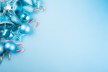Close-up of Christmas decorations on the blue background