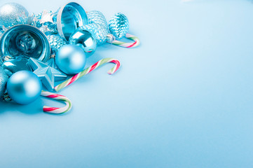 Close-up of Christmas decorations on the blue background
